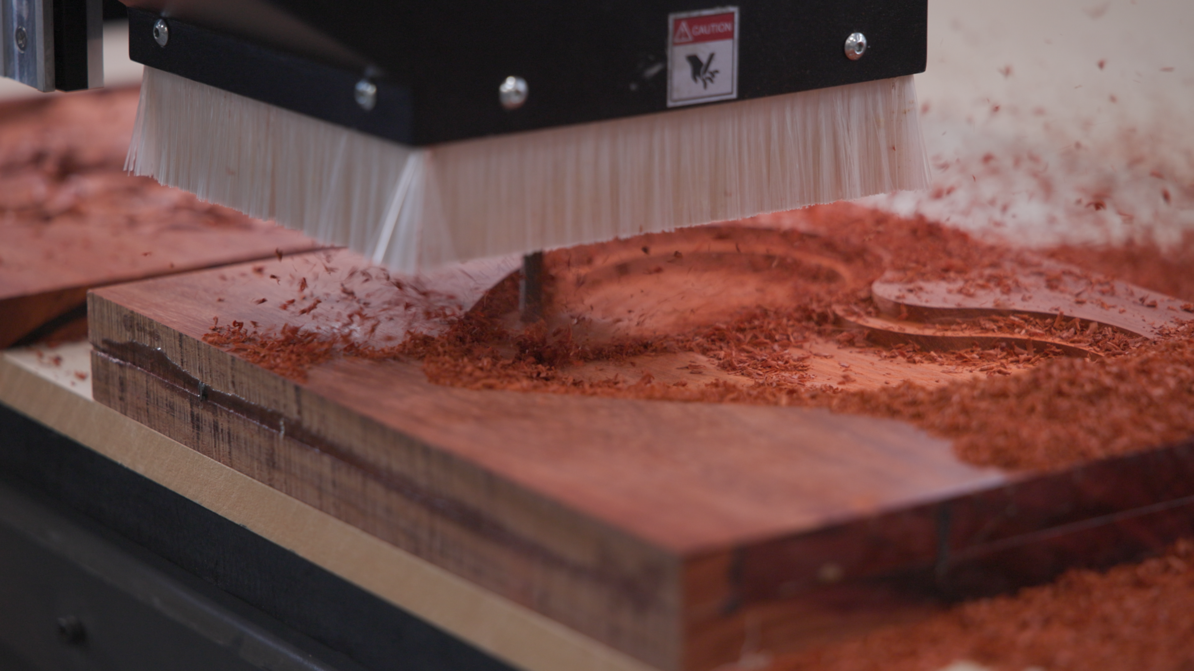 CNC cutting out heart shaped box.